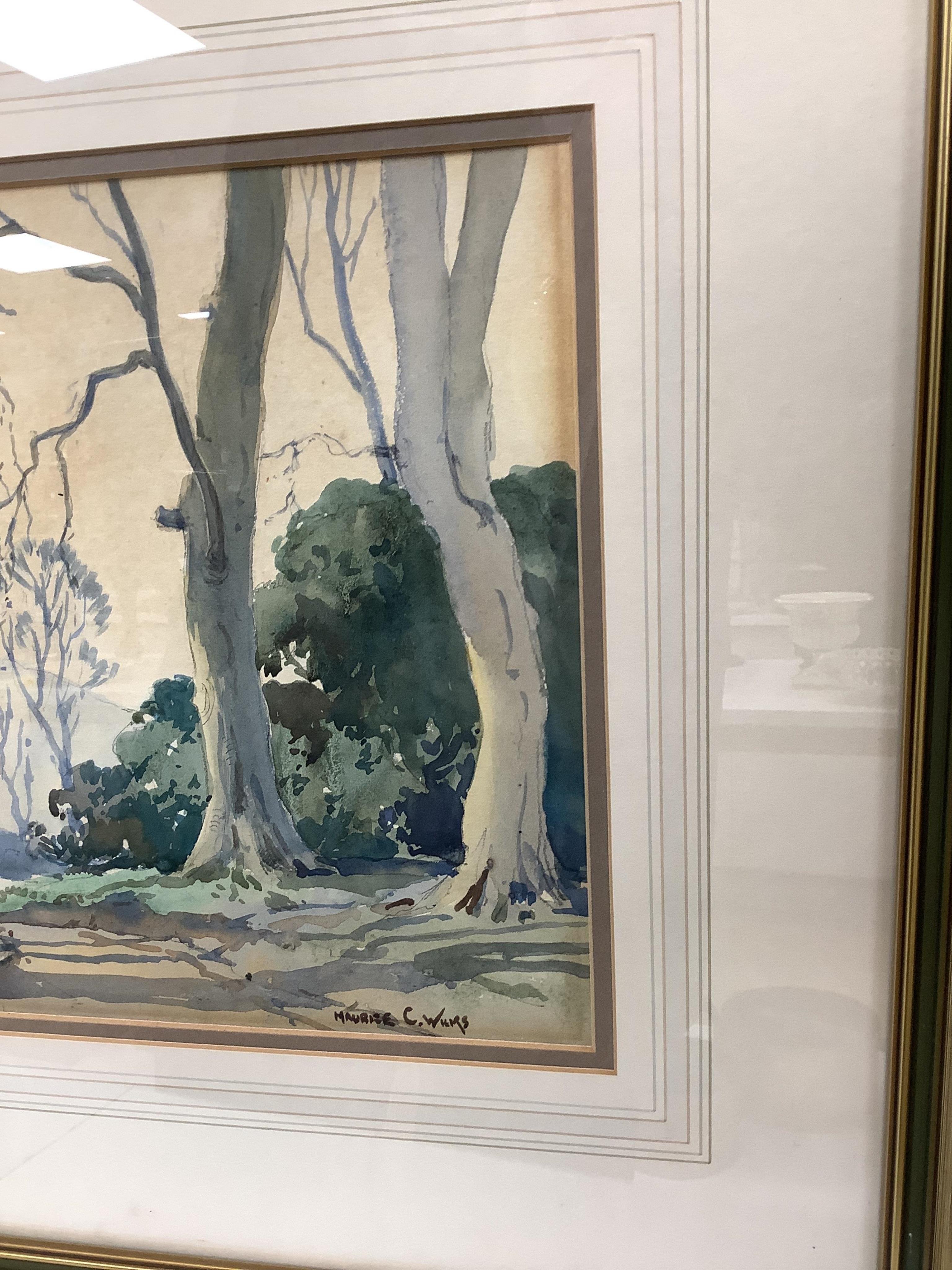 Maurice Canning Wilks (1911-1984), Tree lined pathway with hills beyond, signed, watercolour, 26 x 36cm